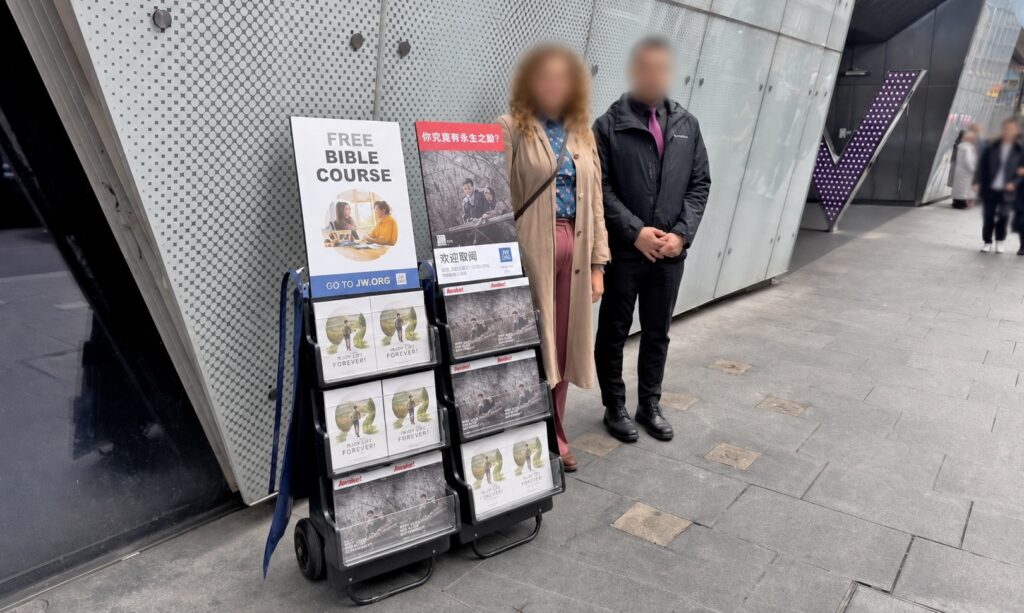 Couple witnessing outside a London station